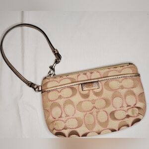 Coach metallic pink and tan wristlet
